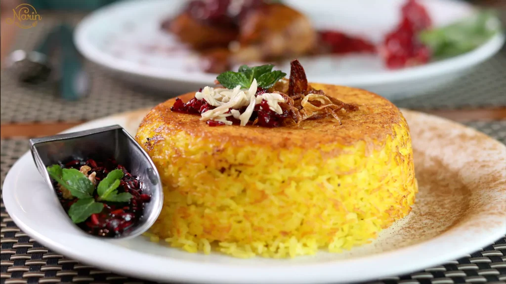 Narin Persian Restaurant banner asking 'What Is Persian Food?' featuring a close-up of crispy golden saffron rice topped with barberries and almonds.