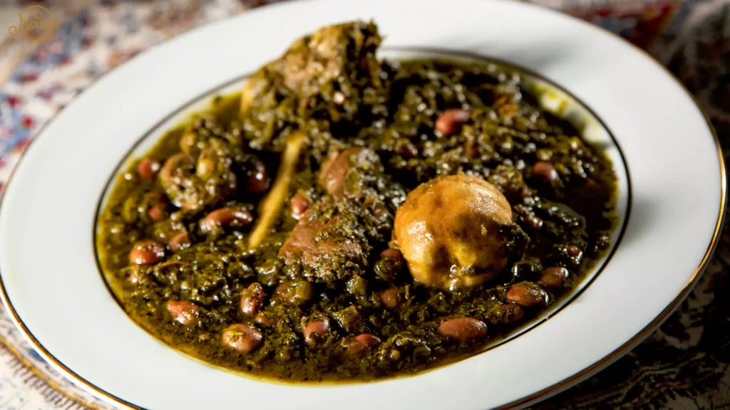 A delicious plate of Ghormeh Sabzi (Persian herb stew) with meat and dried lime, showcasing exactly what to order at a Persian restaurant like Narin.   
